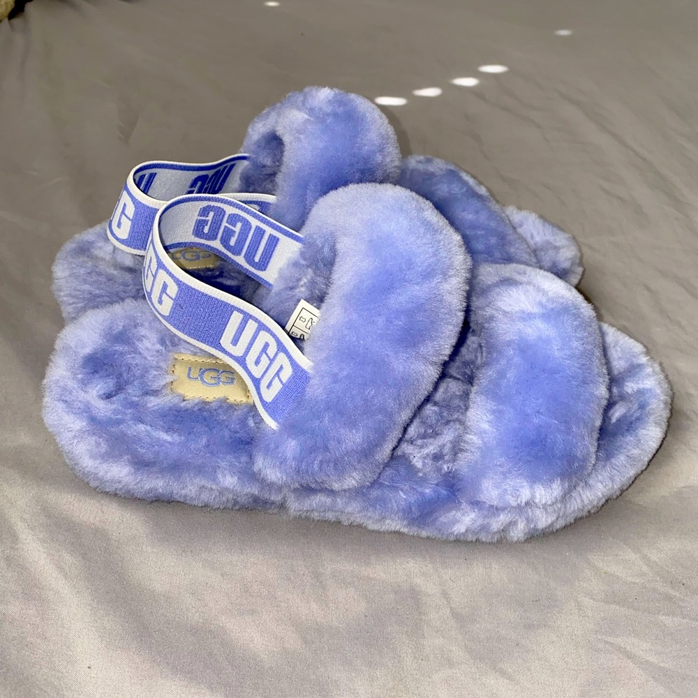 Women UGG fluffy slippers. New!! just tried on.